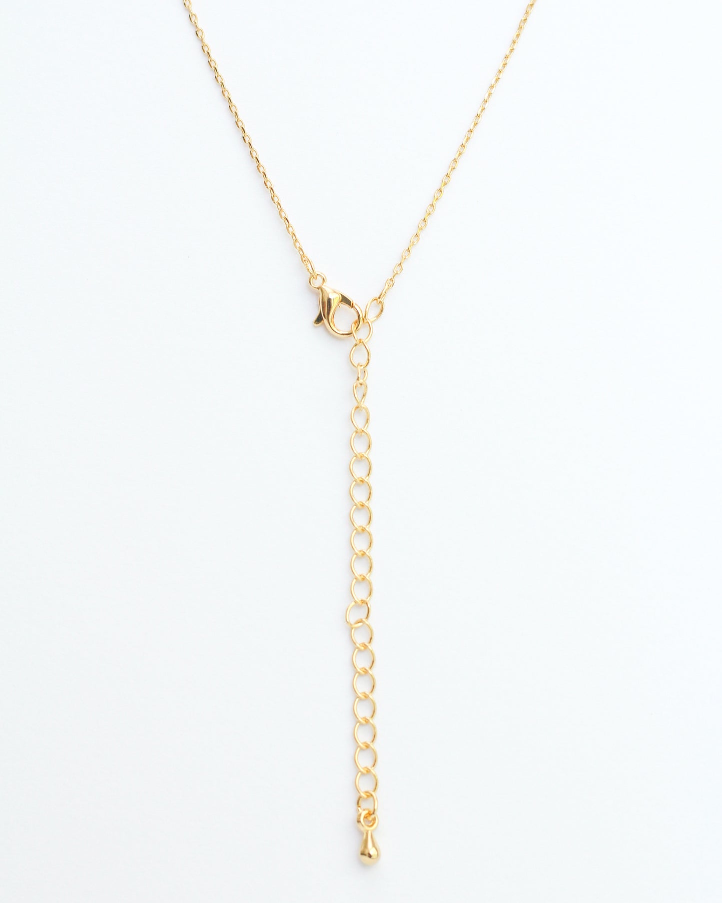 The photo is showing the chain lock and the 3 inch extension. Gold Initial Letter Block Necklace