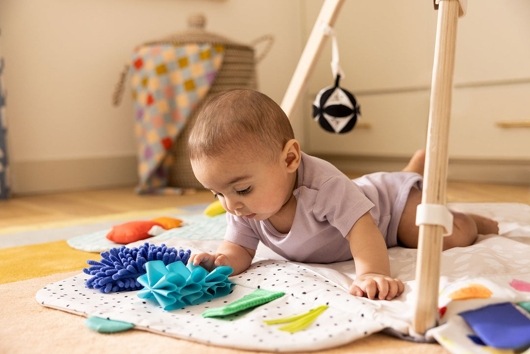 Lovevery baby play gym for tummy time and learning from KADOU Boutique