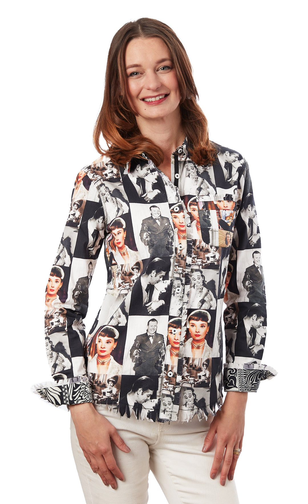 Woman wearing a patterned shirt with black and white images on a white background