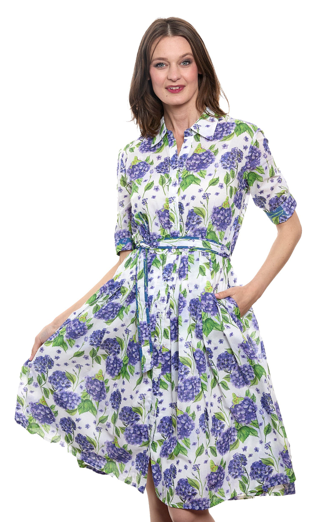 Woman wearing a floral dress with a white background