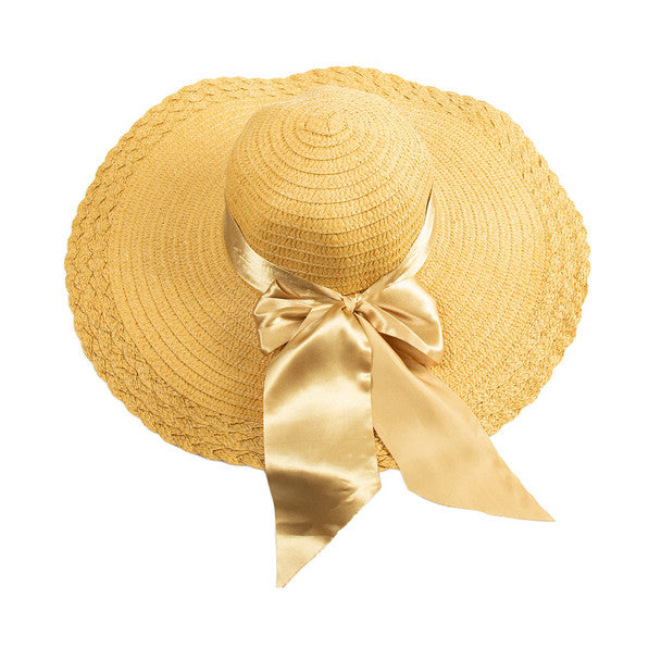 Wide brim bow straw beach hat from KADOU Boutique