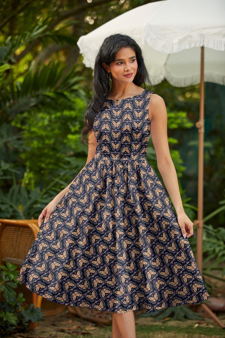 Moth Midi Dress from KADOU Boutique