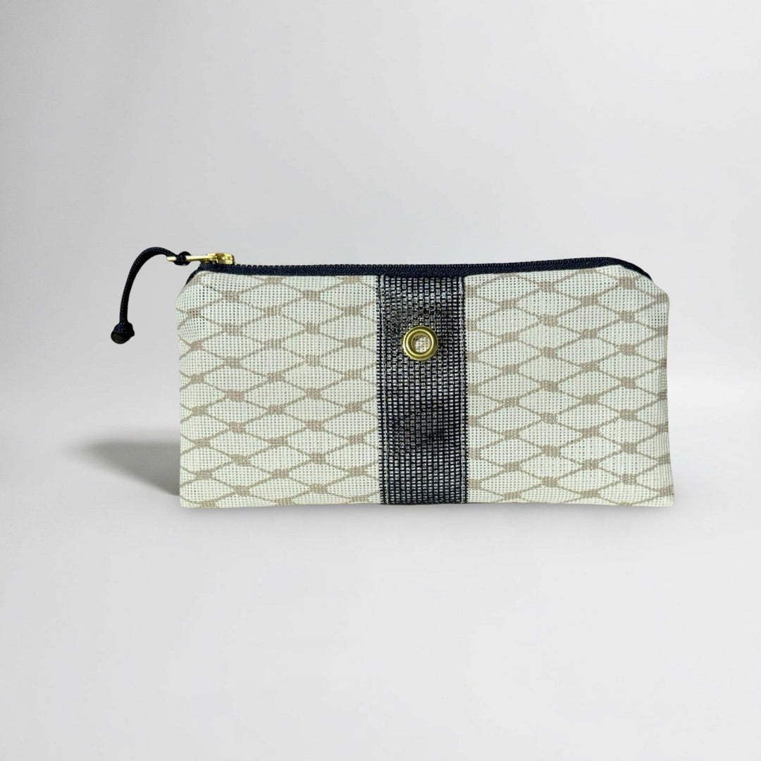 Sand mini clutch from KADOU Boutique