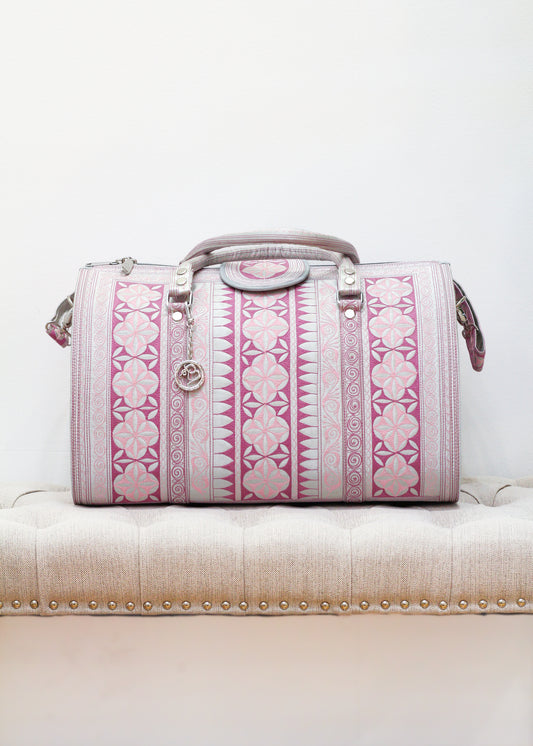 The Dewi Weekender Bag in Pink and White. Available at Kadou Boutique. 