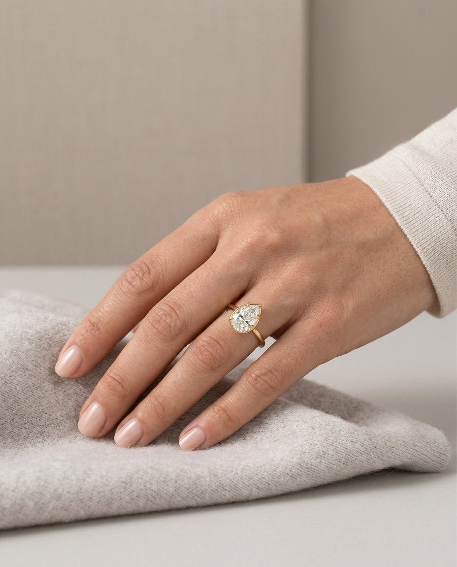 Pear Cut Bezel Ring from KADOU Boutique