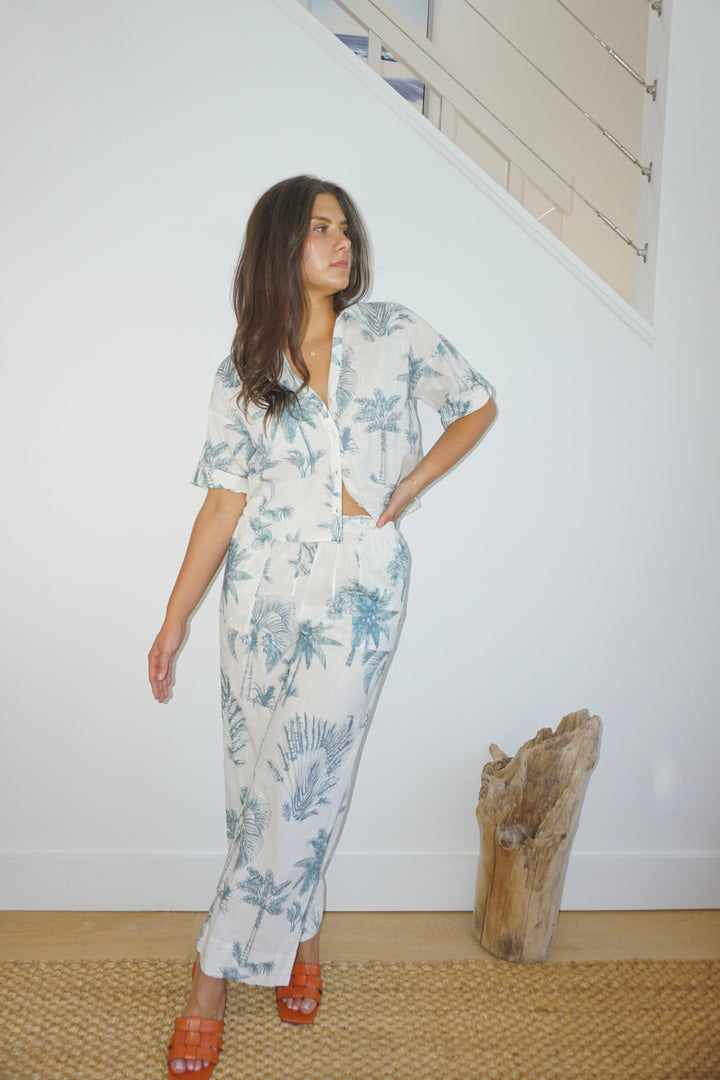 Brenna Pant in Faded Teal Palms from KADOU Boutique