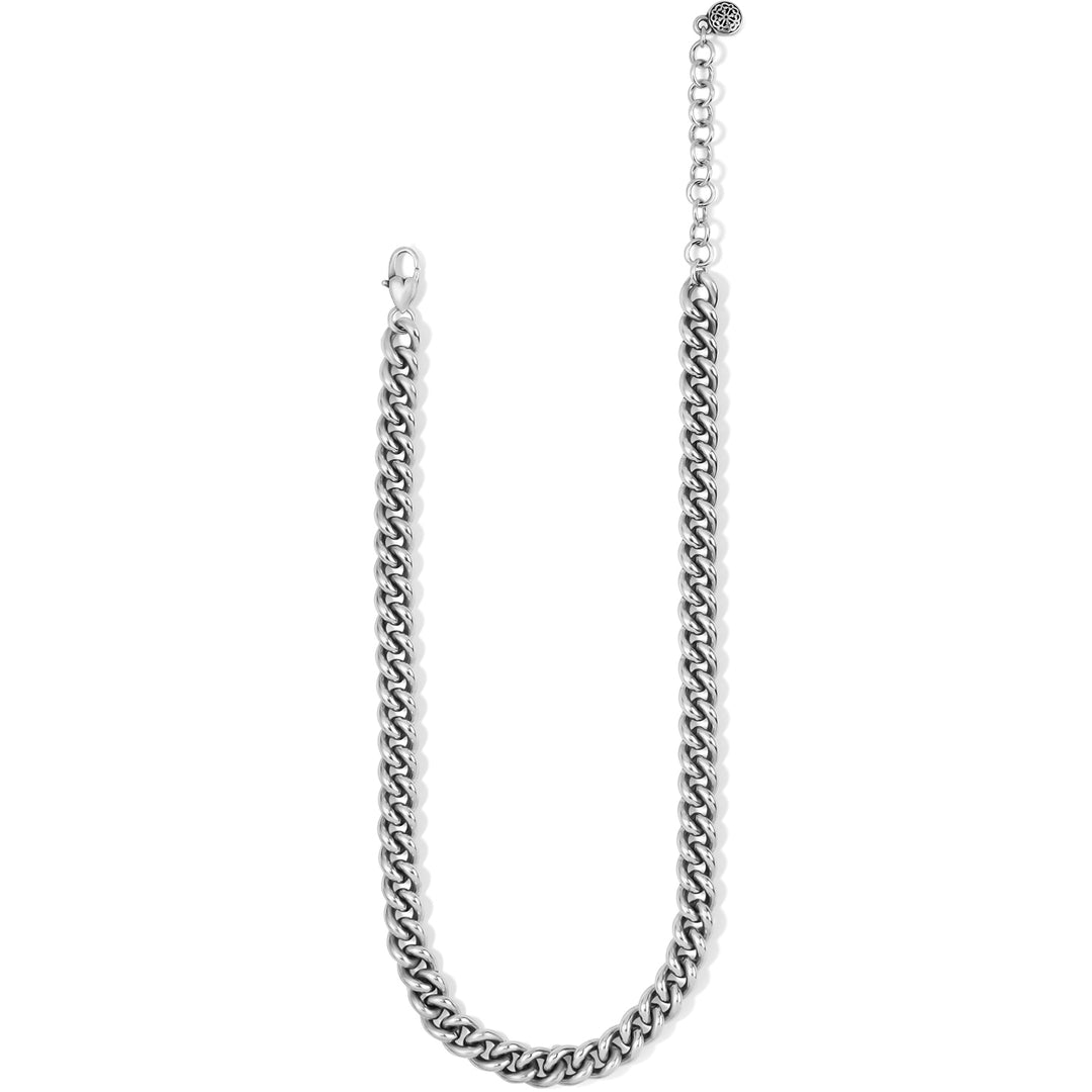 Showing the silver chain necklace with its adjustable extension on a white background 