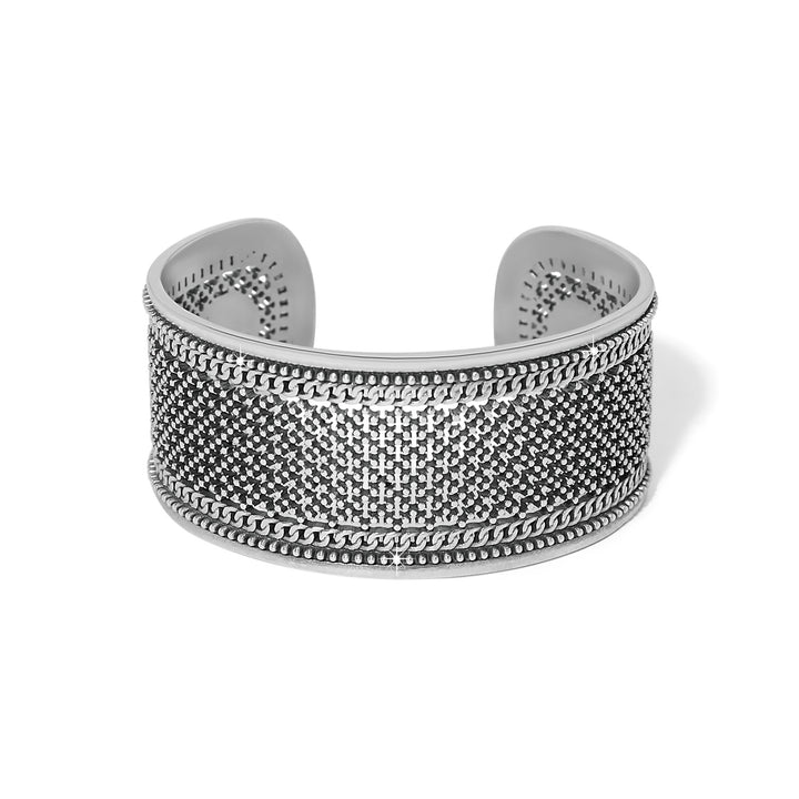 Silver textured cuff bracelet on a white background