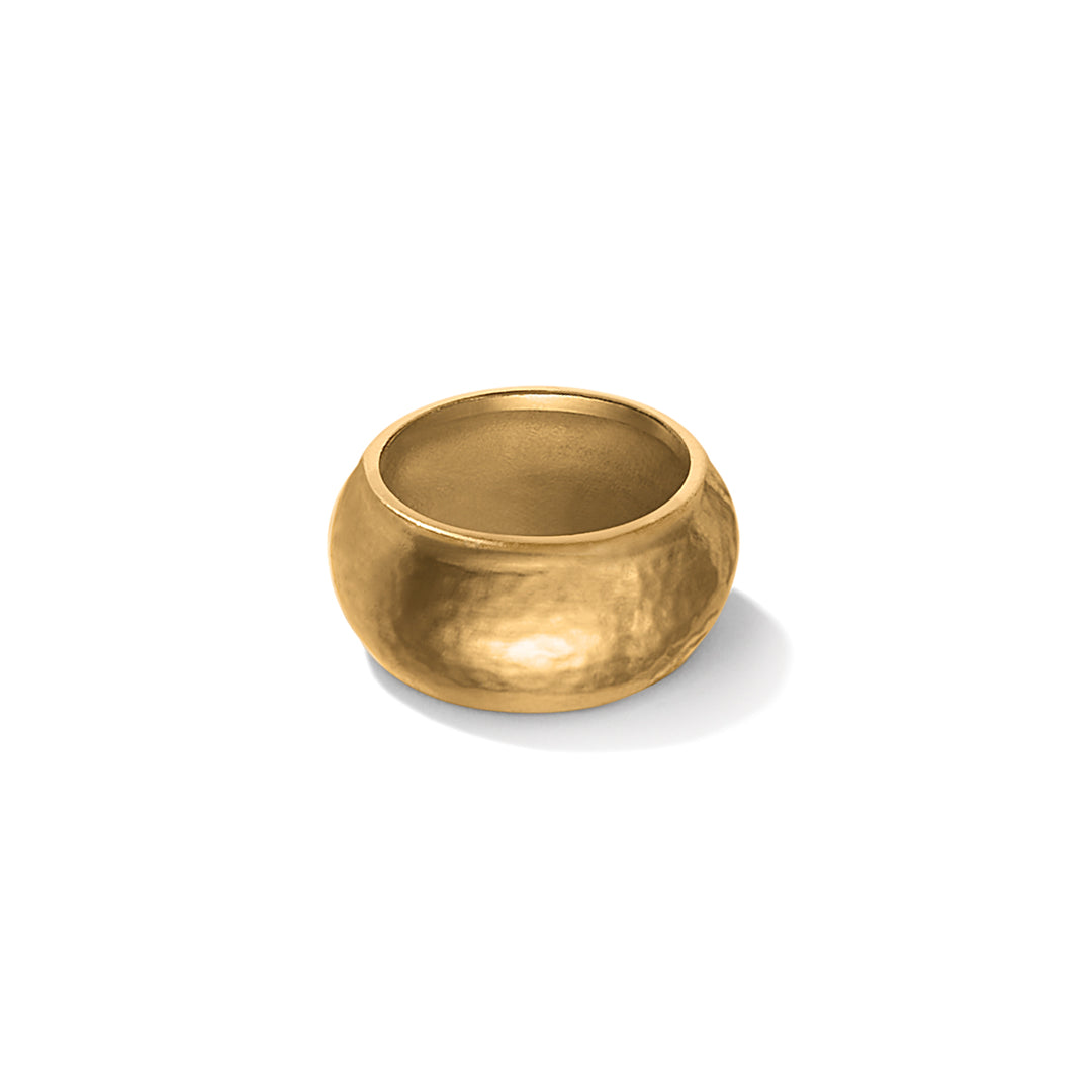Gold wide band ring on a white background
