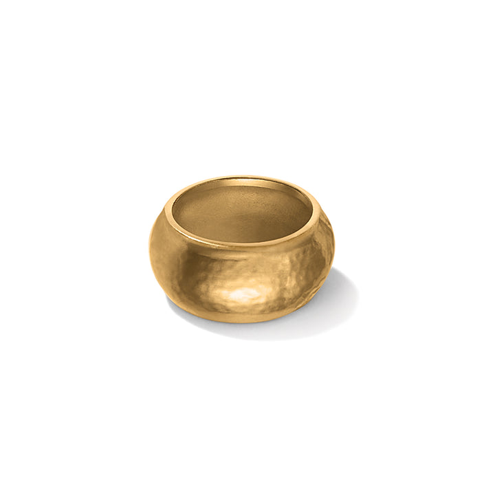 Gold wide band ring on a white background