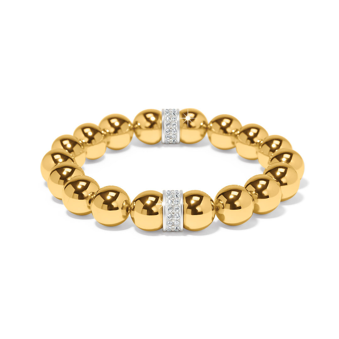 Gold beaded bracelet with diamond accents on a white background