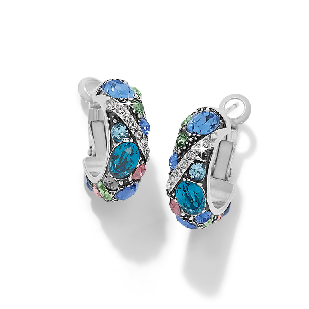 Pair of hoop earrings with multicolored gemstones on a white background