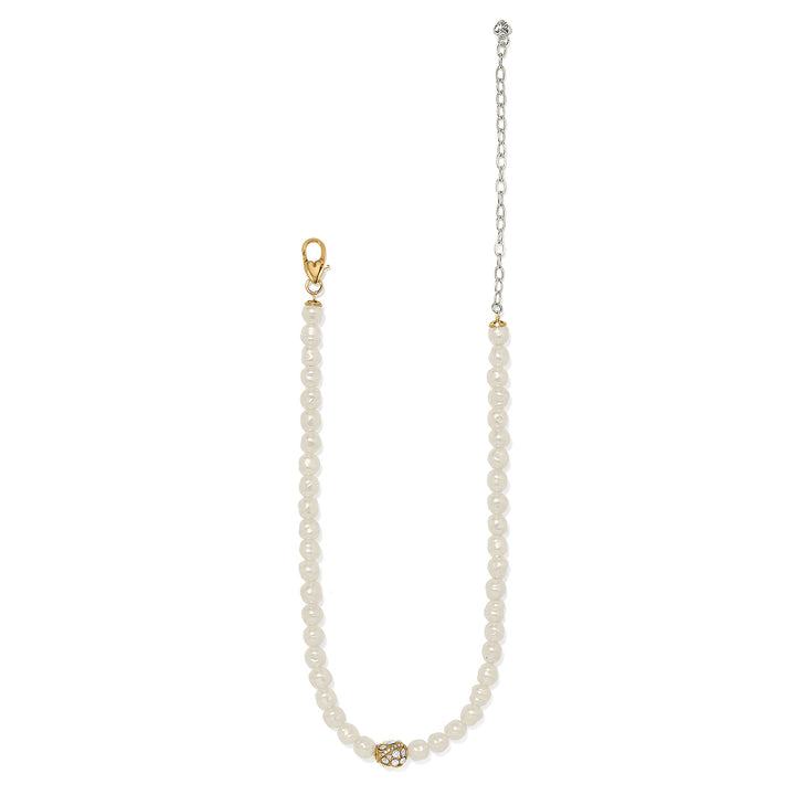 Pearl necklace with gold clasp and adjustable chain on a white background