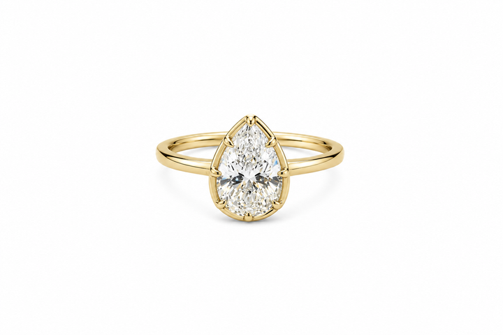 Pear Cut Bezel Ring from KADOU Boutique