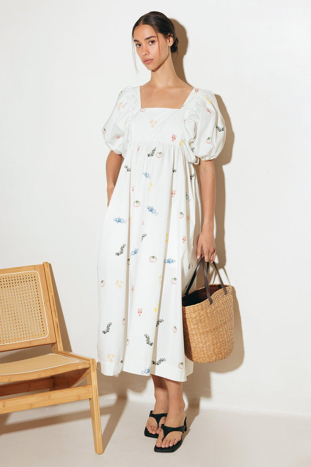The World Is Yours Woven Midi Dress from KADOU Boutique