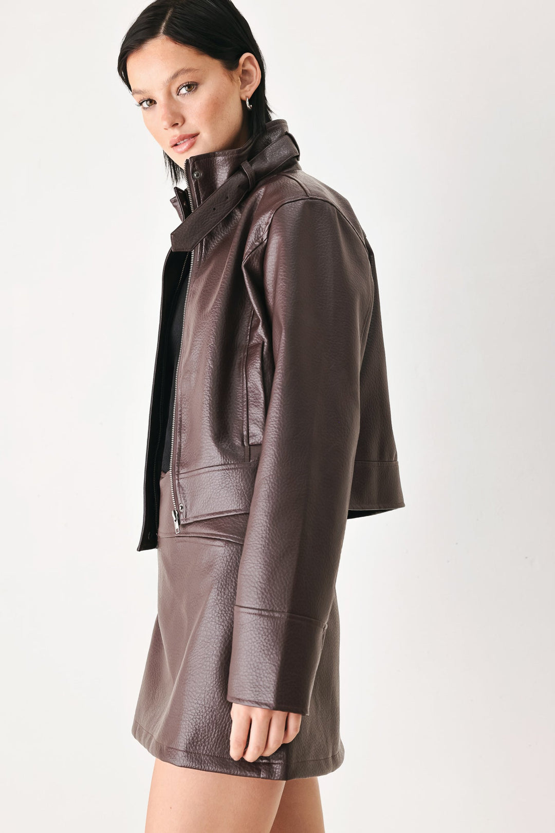 Rebel Romance Buckled Faux Leather Cropped Jacket from KADOU Boutique