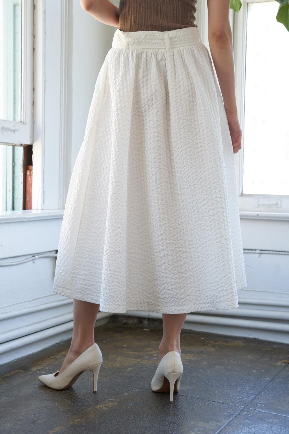 Talk to the Sand Woven Midi Skirt from KADOU Boutique