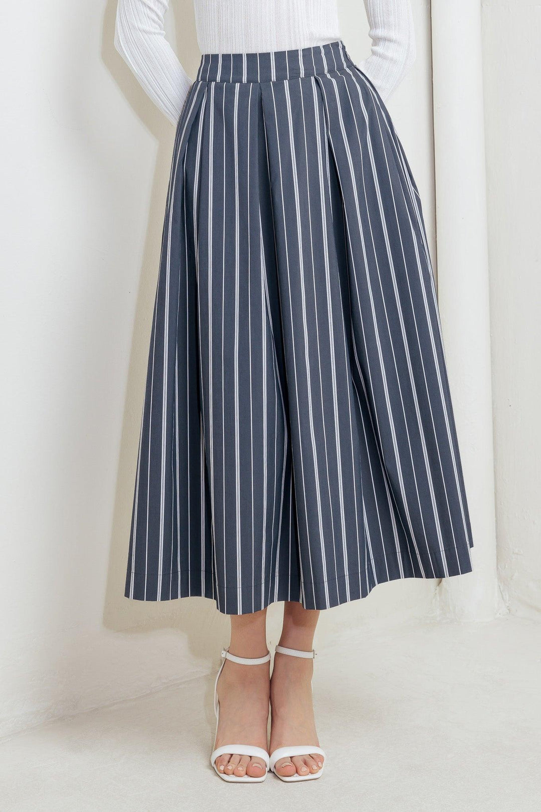 Behind the Grin Woven Midi Skirt from KADOU Boutique
