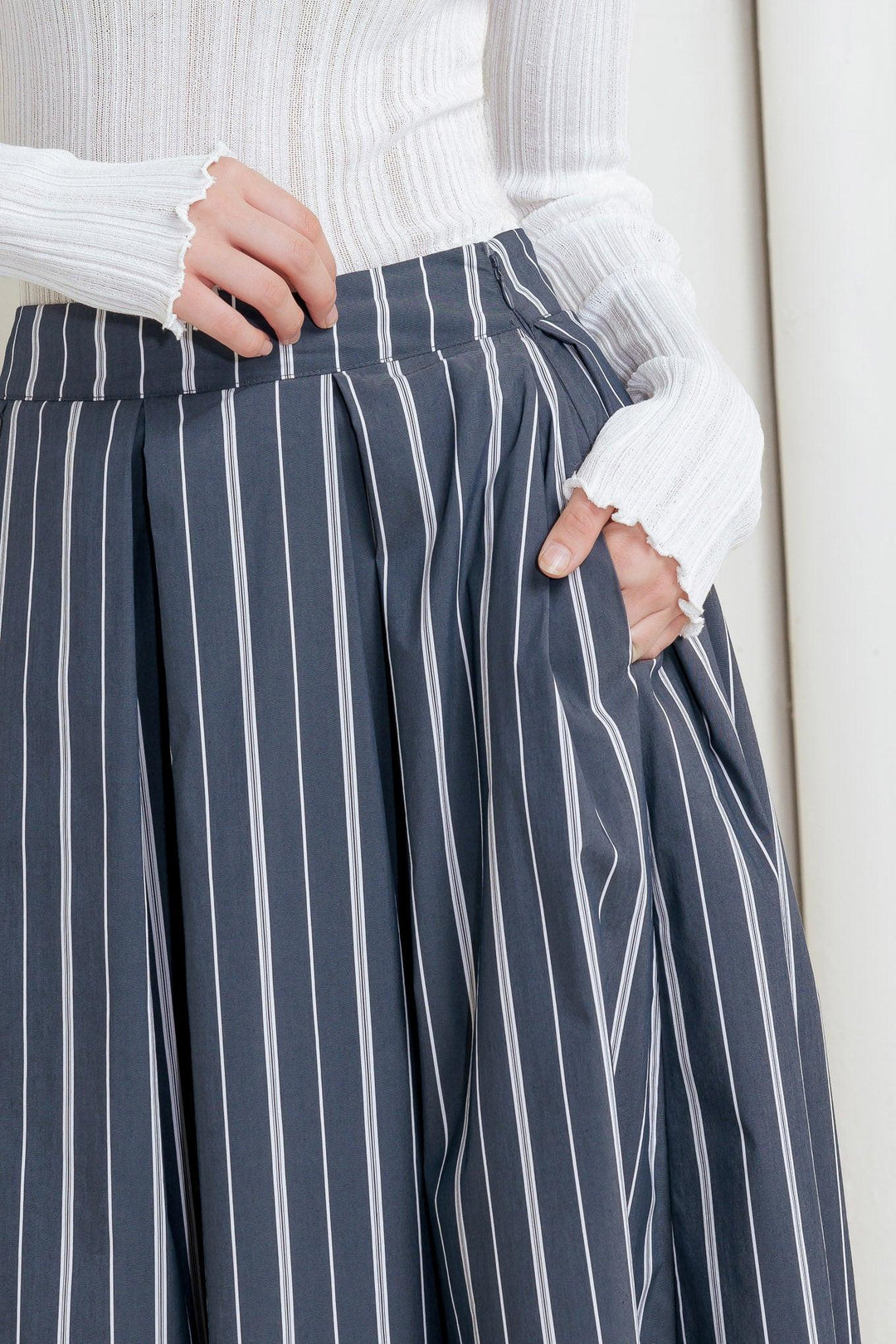 Behind the Grin Woven Midi Skirt from KADOU Boutique