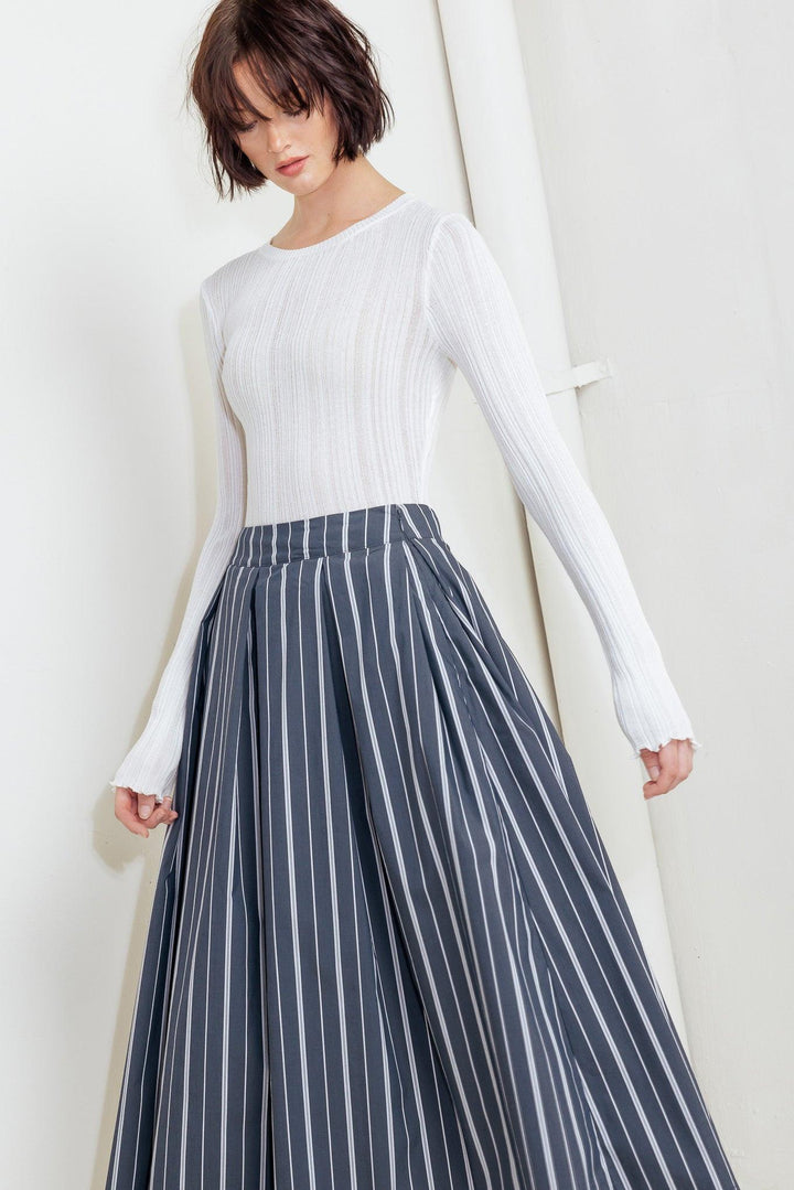 Behind the Grin Woven Midi Skirt from KADOU Boutique