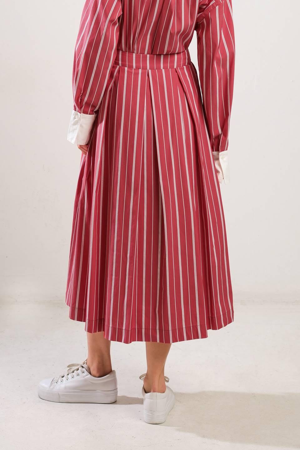 Behind the Grin Woven Midi Skirt from KADOU Boutique