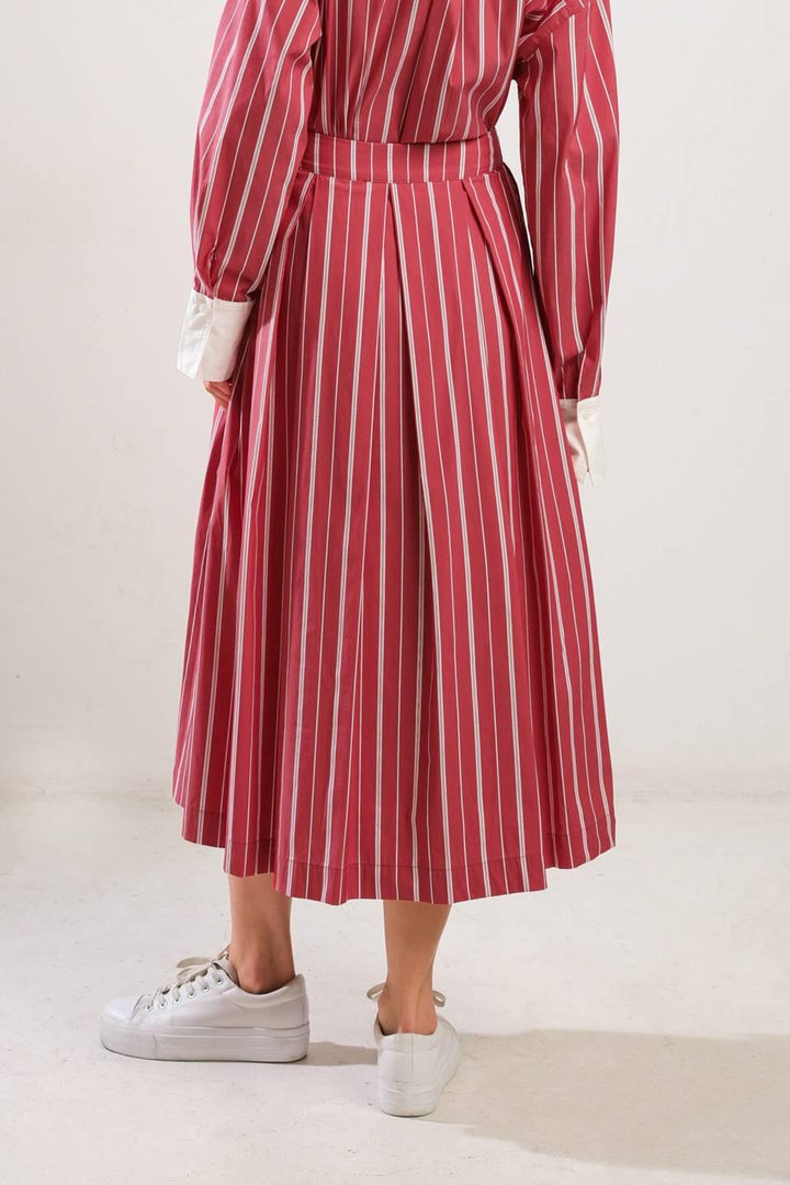 Behind the Grin Woven Midi Skirt from KADOU Boutique