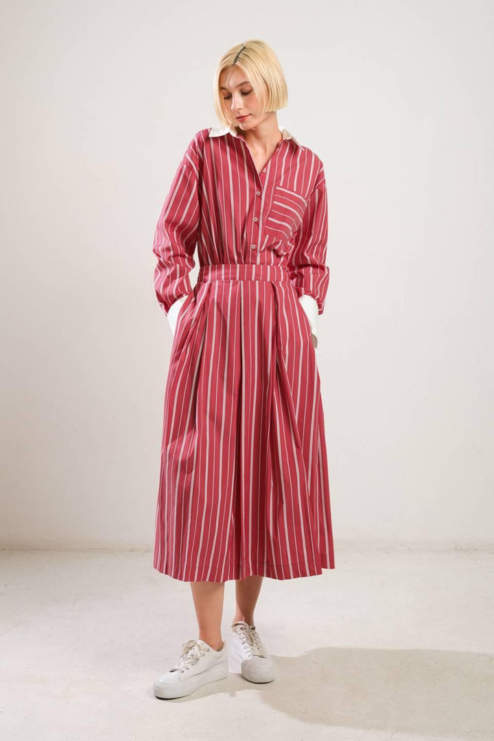 Behind the Grin Woven Midi Skirt from KADOU Boutique
