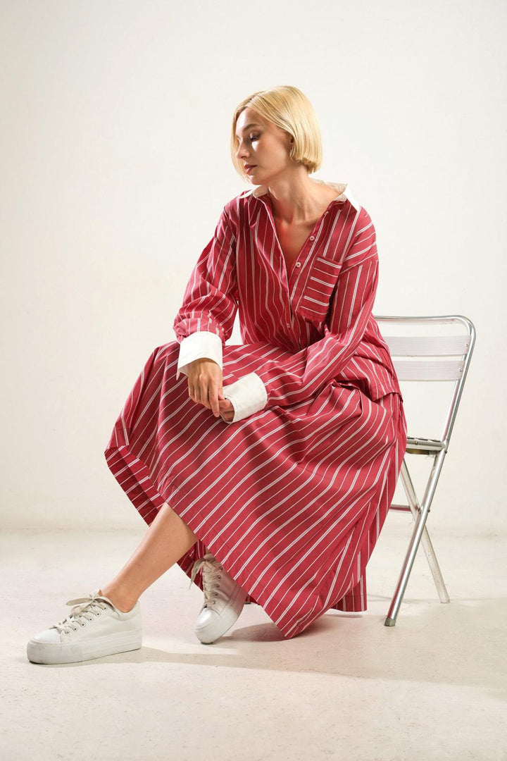 Behind the Grin Woven Midi Skirt from KADOU Boutique