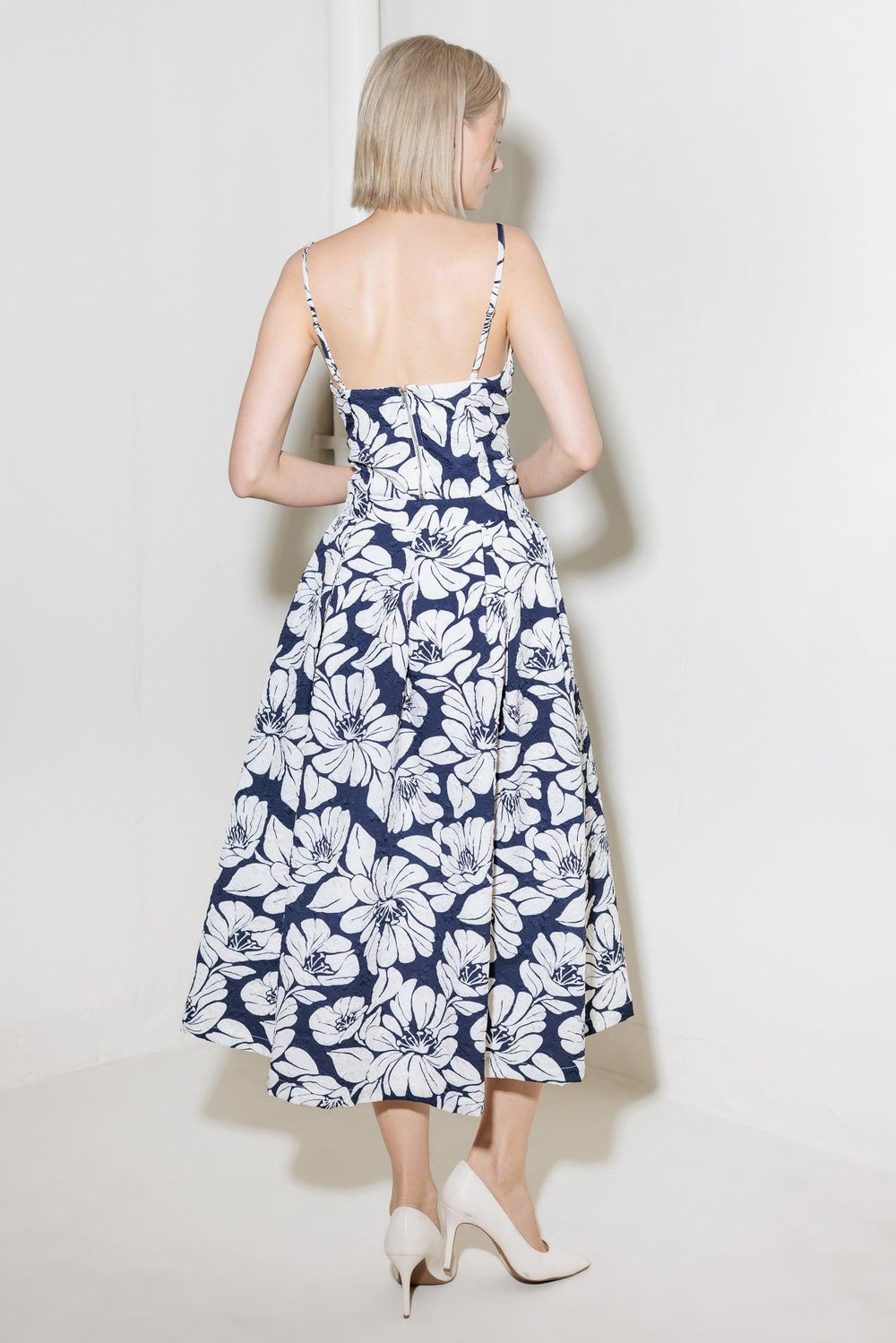 Plain Optimism Navy Woven Midi Skirt from KADOU Boutique