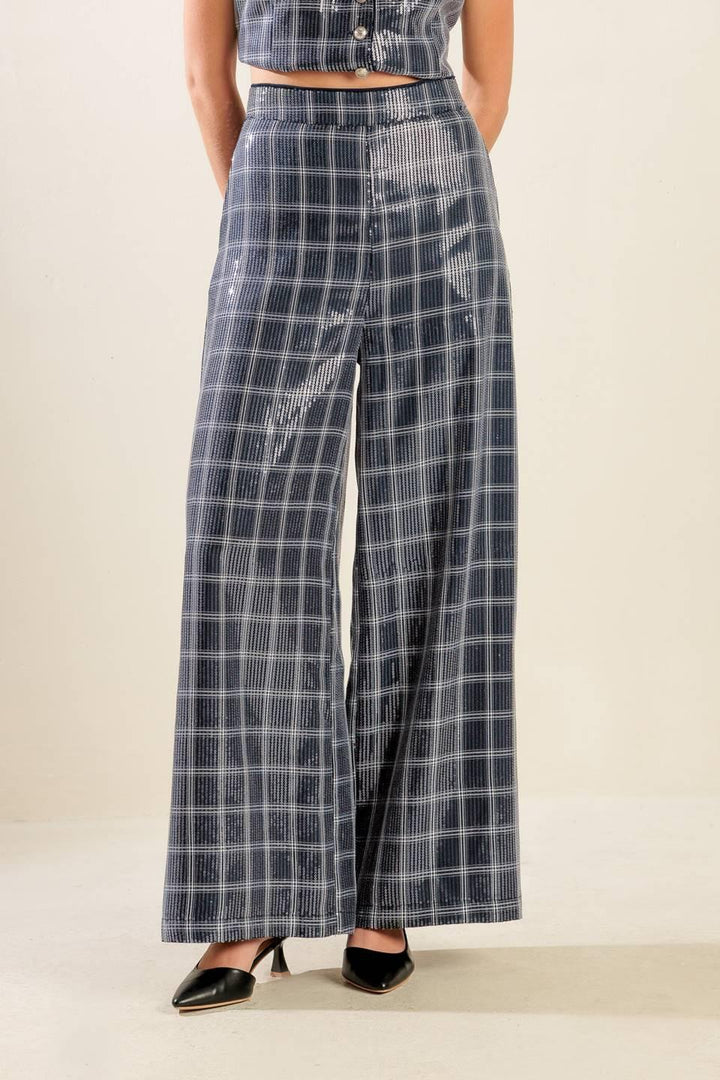Traveling Far Navy Sequin Pants from KADOU Boutique