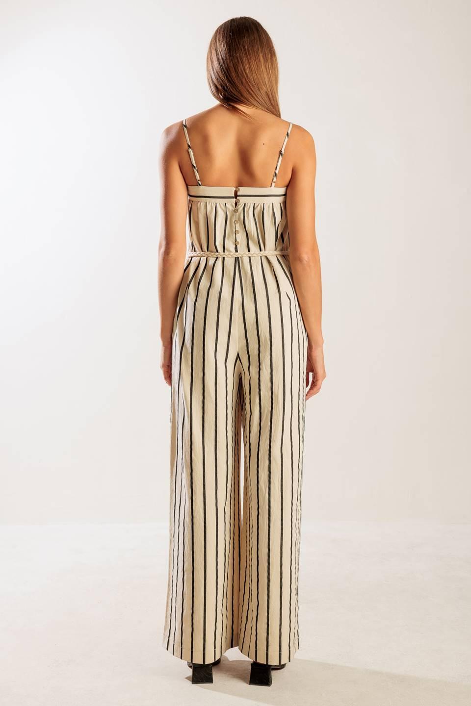 Just the Beginning Woven Jumpsuit from KADOU Boutique