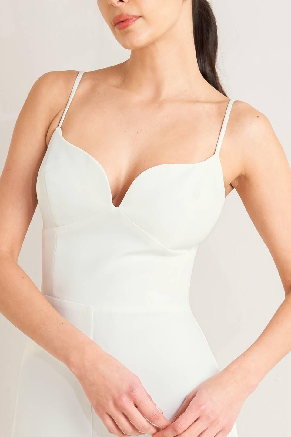 Pristine Edge Off White Woven Jumpsuit from KADOU Boutique