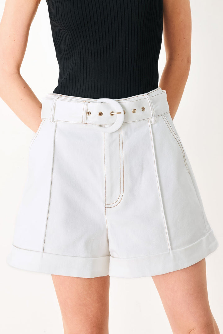 White shorts with a belt worn by a person on a white background