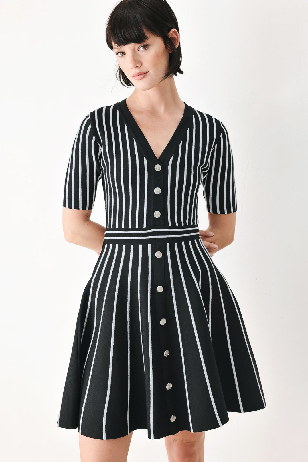 Black Parlor Melody Sweater Mini Dress from KADOU Boutique