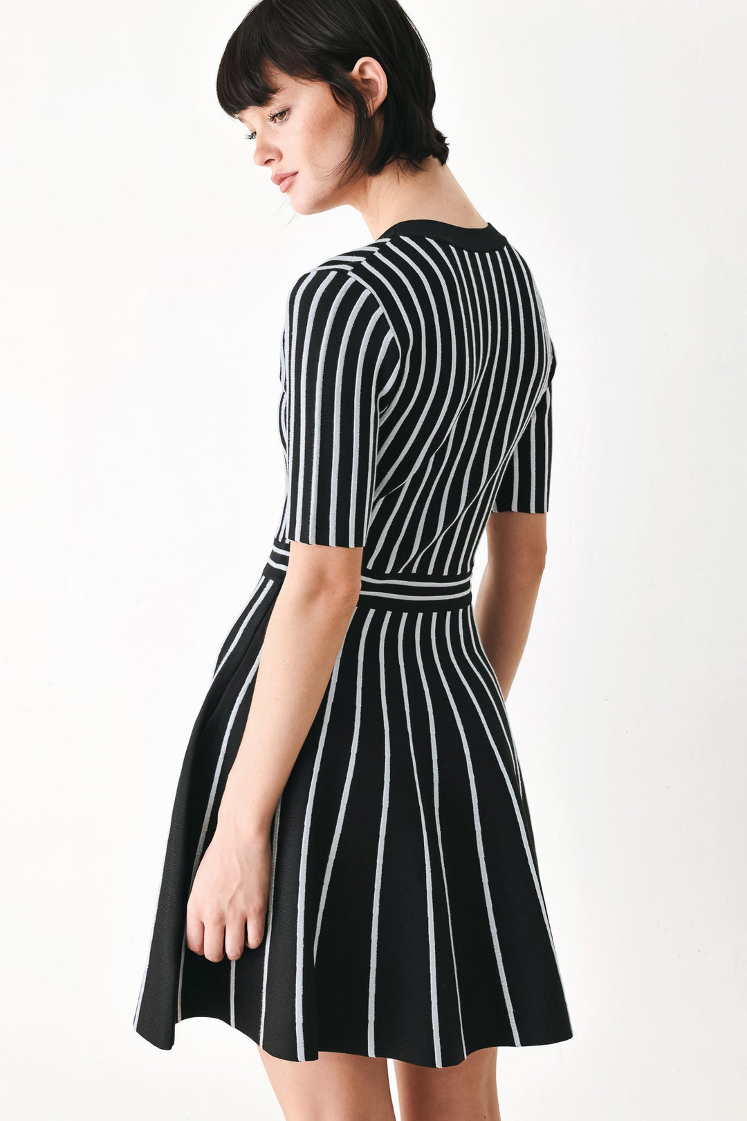 Black Parlor Melody Sweater Mini Dress from KADOU Boutique