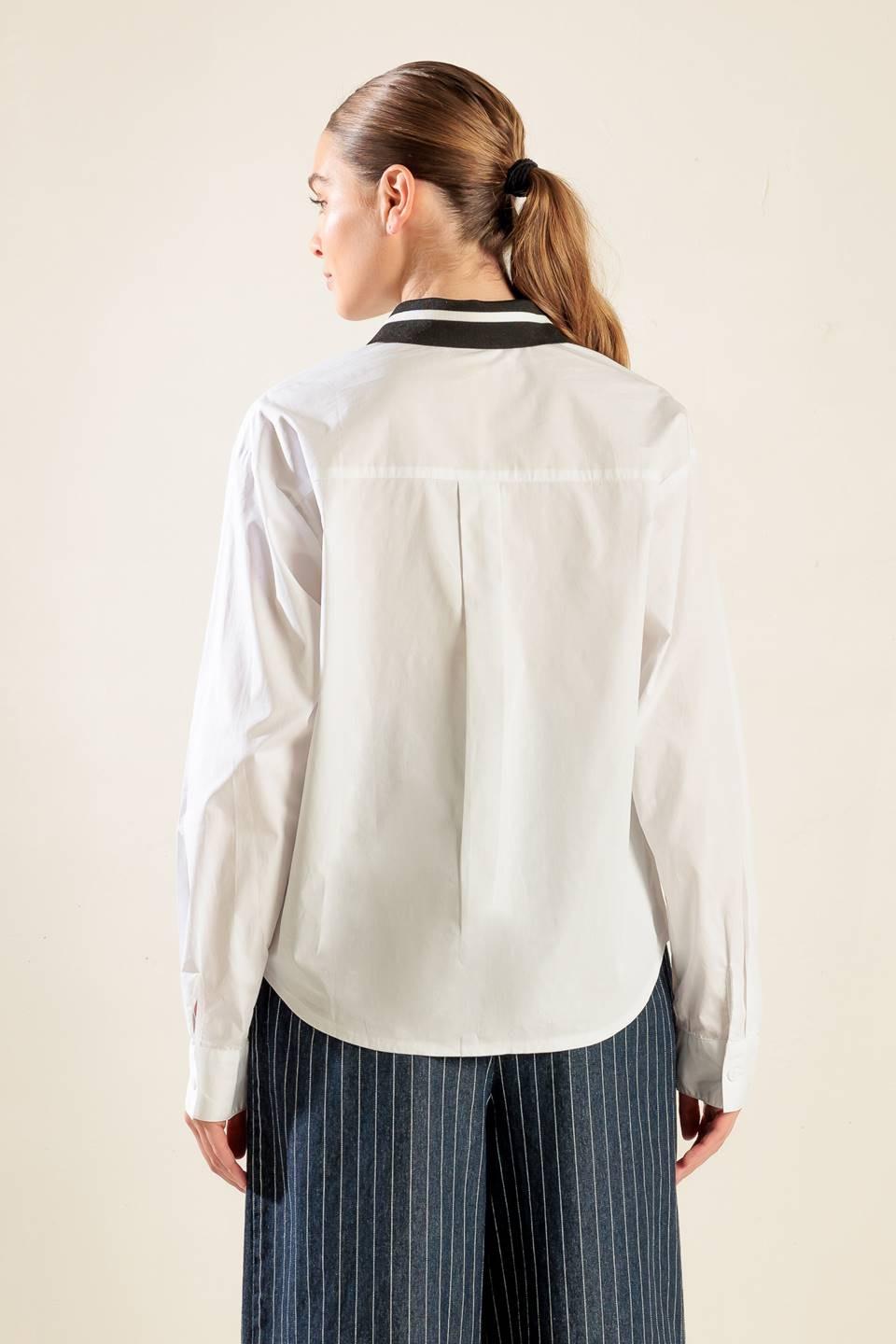 Cause a Commotion Woven Top from KADOU Boutique