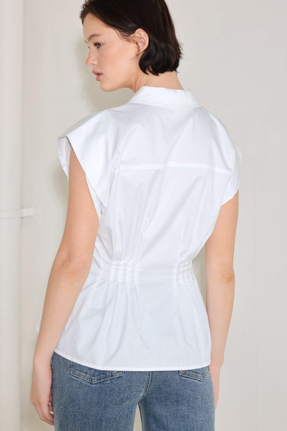 Modern Poise Woven Top from KADOU Boutique