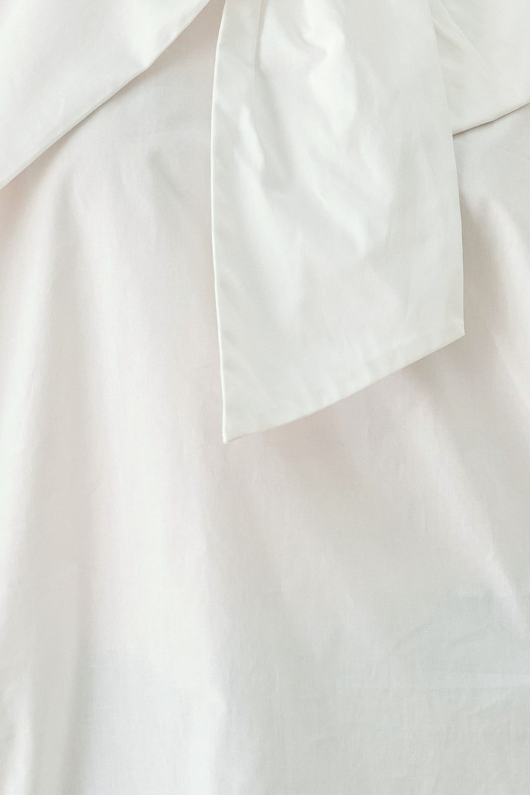 IVORY IMPACT OFF WHITE ASYMMETRICAL TIE-NECK PUFF-SLEEVE TOP