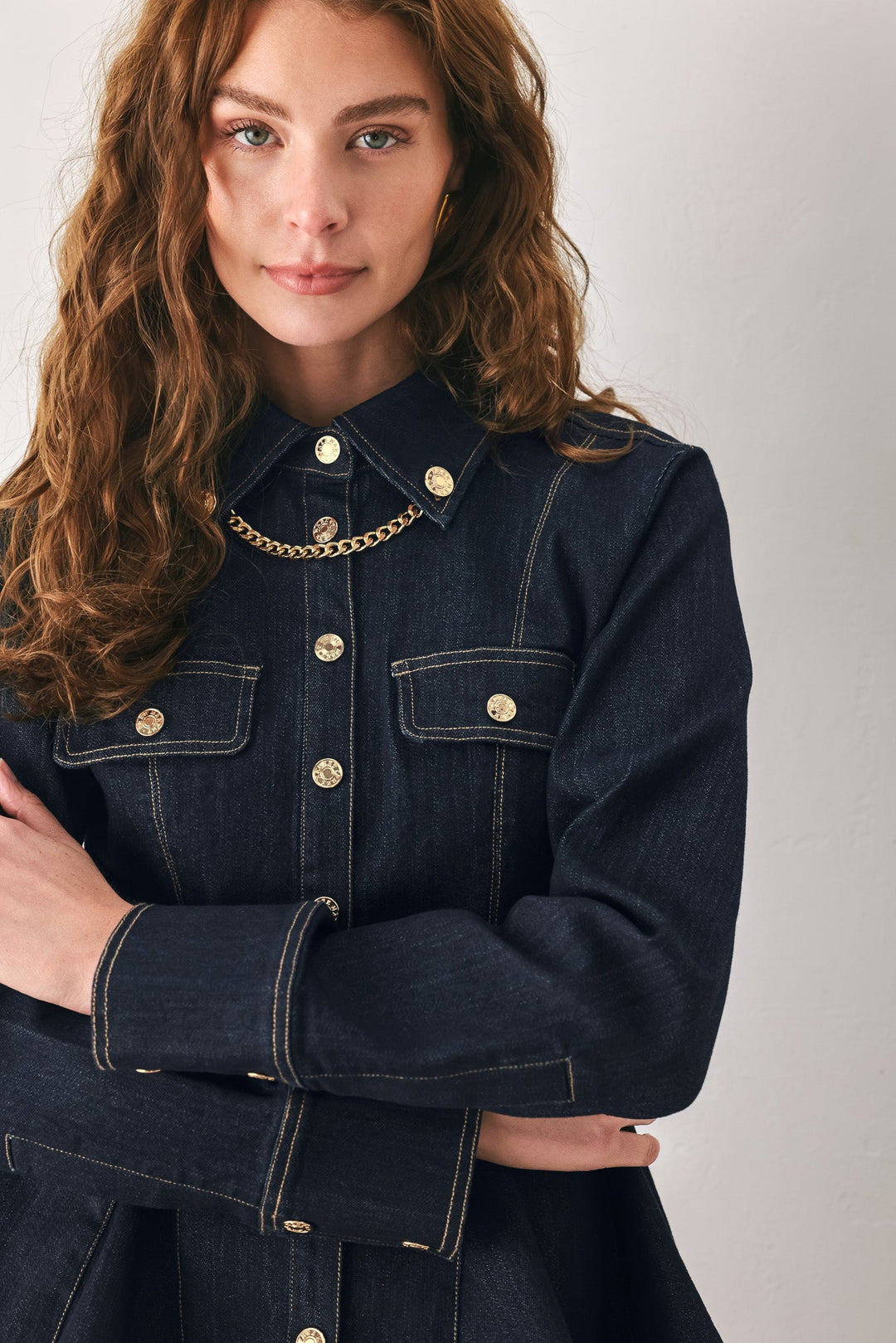INDIGO ICON DARK INDIGO CHAIN-DETAIL PEPLUM DENIM TOP