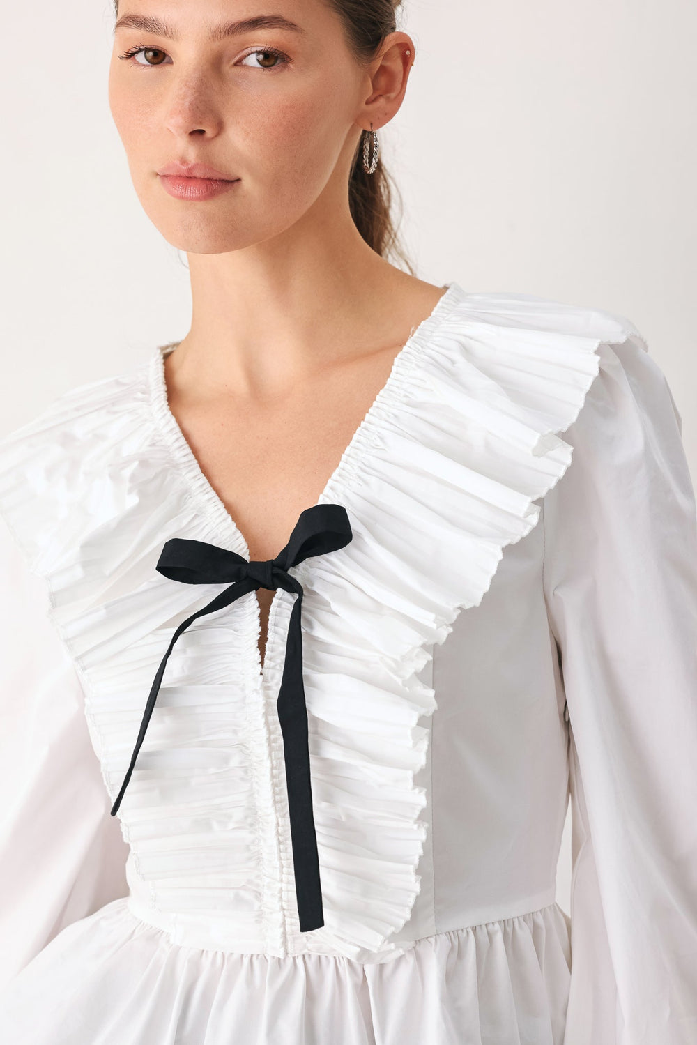 Amelie Pleated Ruffle V-Neck Woven Top from KADOU Boutique
