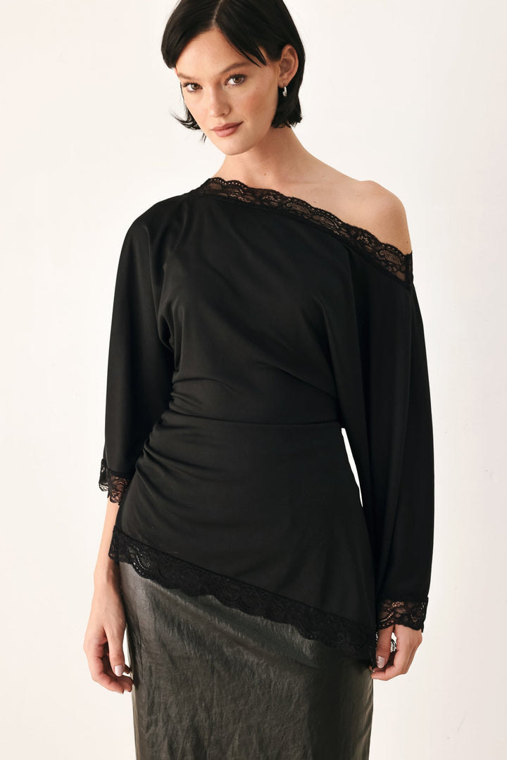 After Hours Lace Trim Asymmetrical Top from KADOU Boutique