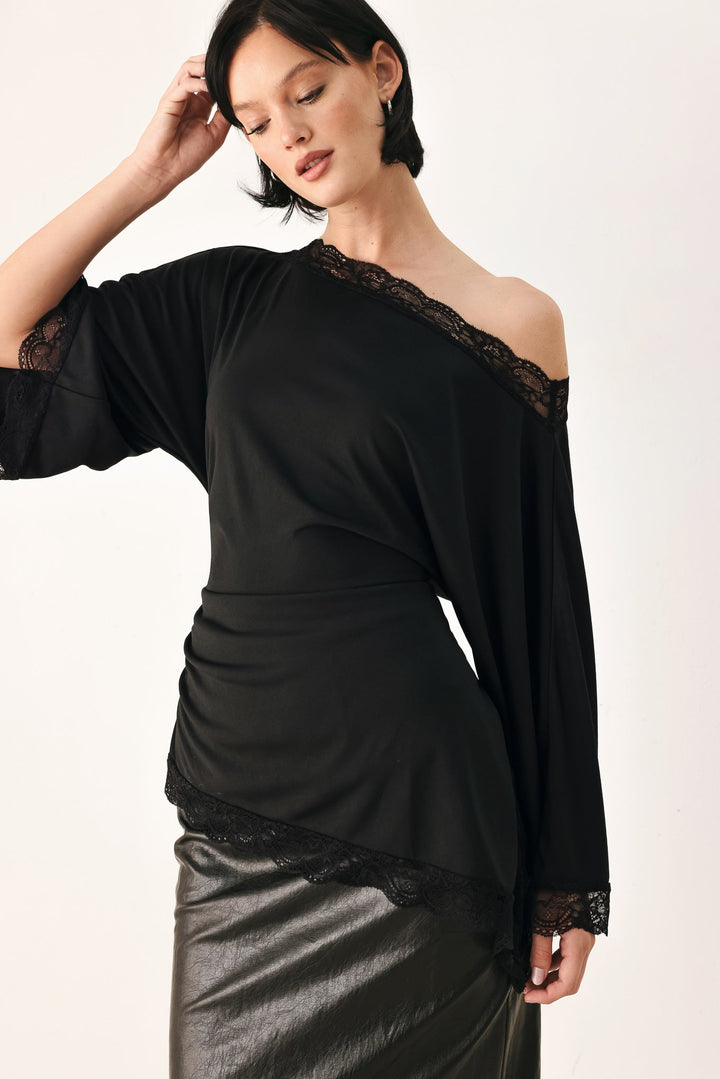 After Hours Lace Trim Asymmetrical Top from KADOU Boutique