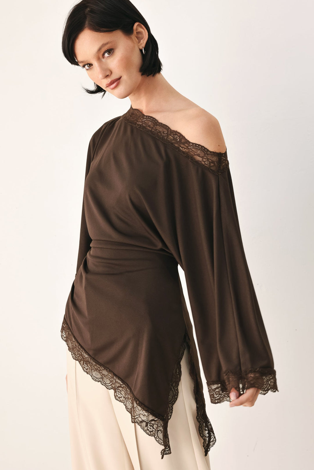 After Hours Lace Trim Asymmetrical Top from KADOU Boutique