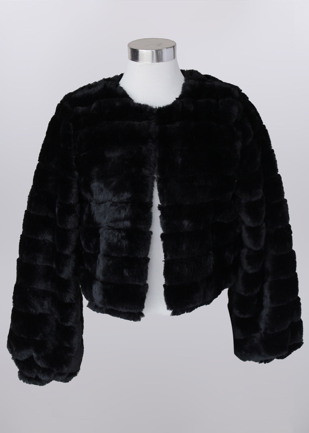 Black fur jacket on a mannequin against a white background