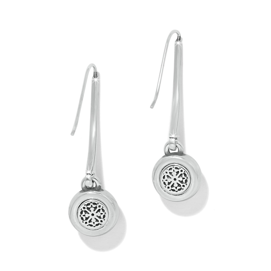 Pair of silver earrings with intricate designs on a white background, a view of the back of the earrings.