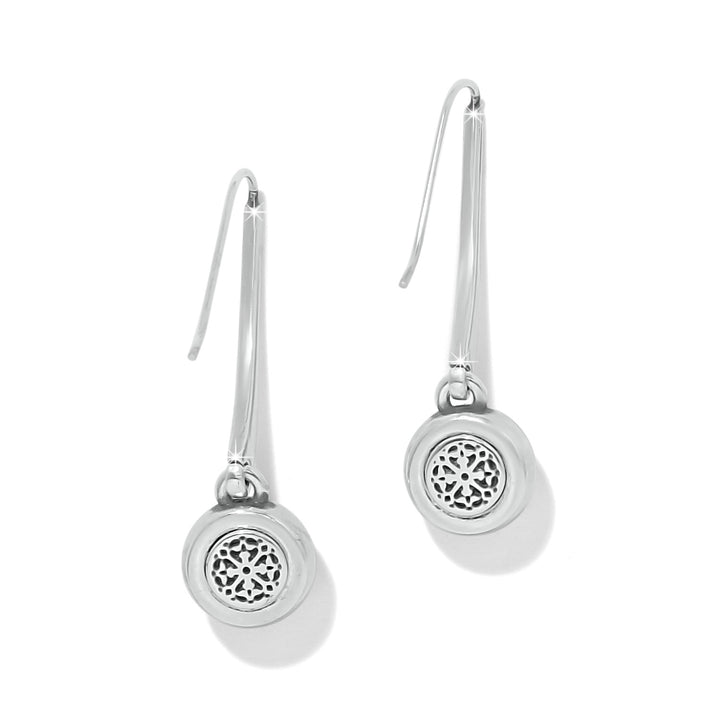Pair of silver earrings with intricate designs on a white background, a view of the back of the earrings.