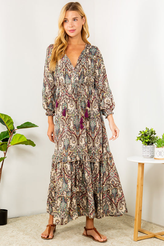 The model is wearing the Floral Layered Maxi Dress - Purple. From Kadou Boutique.