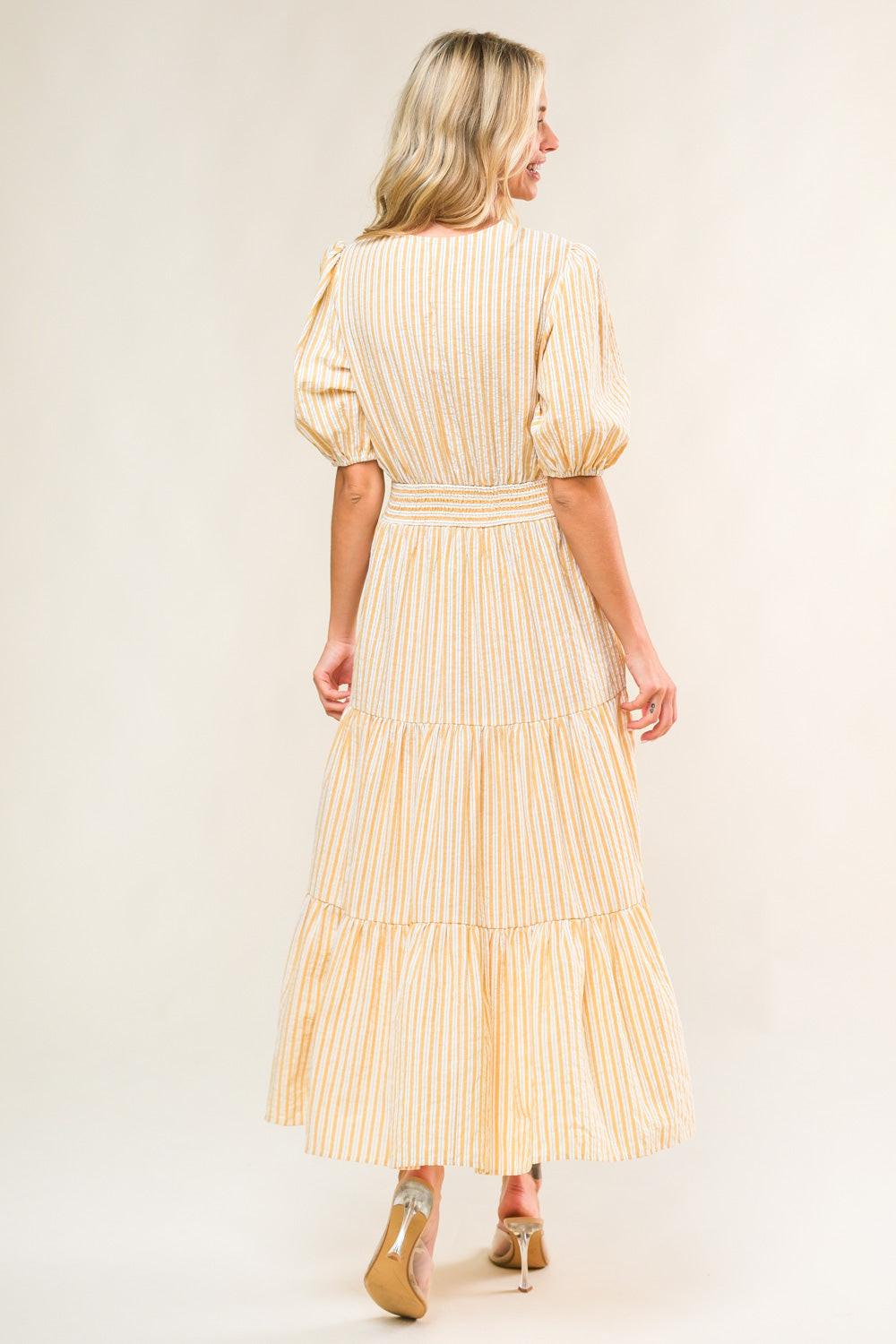 With the Girls Woven Midi Dress from KADOU Boutique