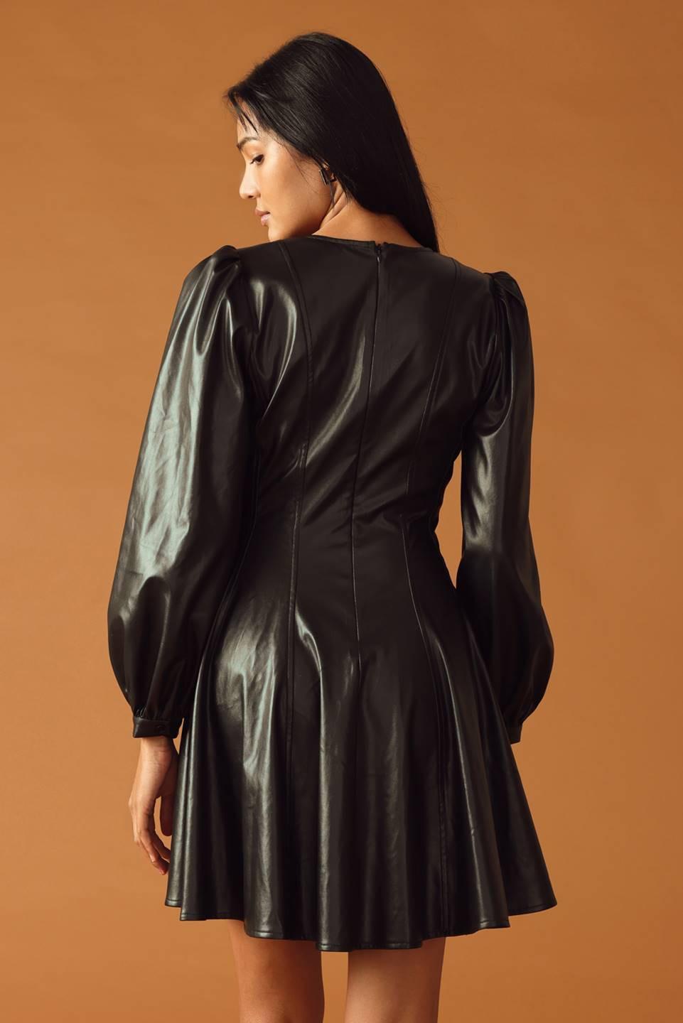 Change of Pace Faux Leather Mini Dress from KADOU Boutique