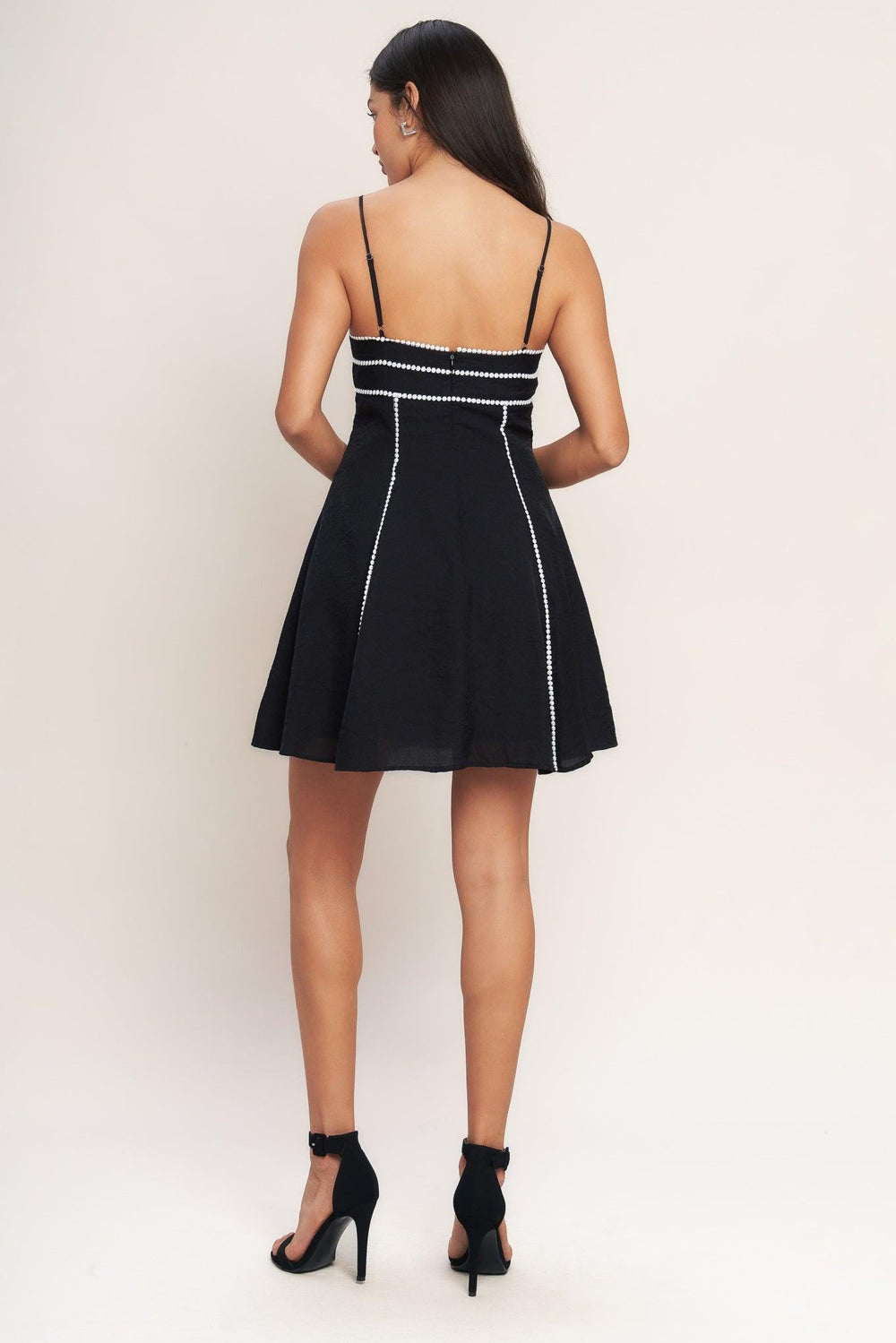 All Eyes On You Woven Mini Dress from KADOU Boutique